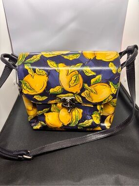 Patricia Nash Leather Leandra Flap Crossbody bag in the Positano Lemon pattern.